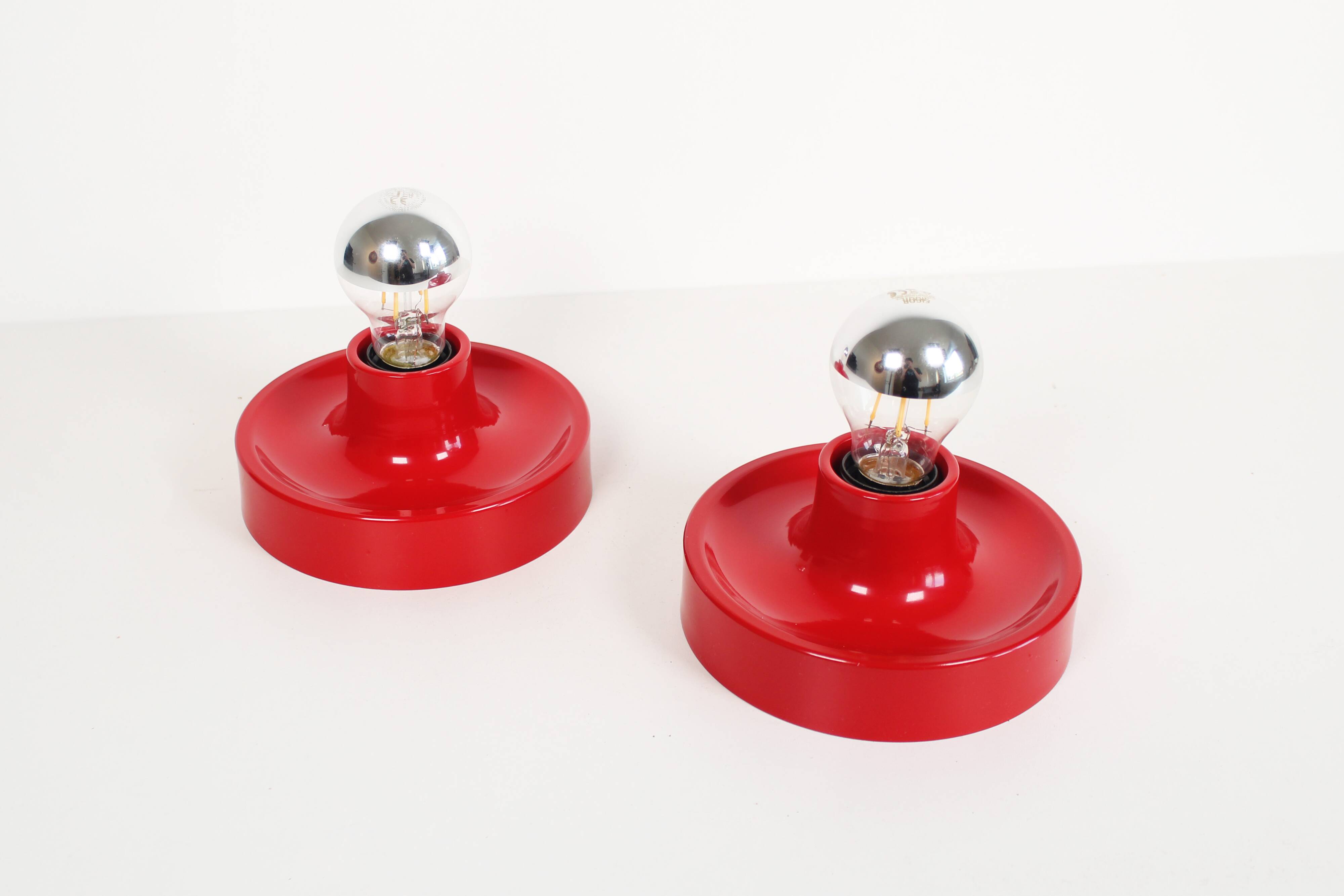 Pair of petite Disc sconces selected by Charlotte Perriand for Les Arcs