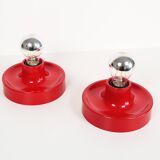 Pair of petite Disc sconces selected by Charlotte Perriand for Les Arcs