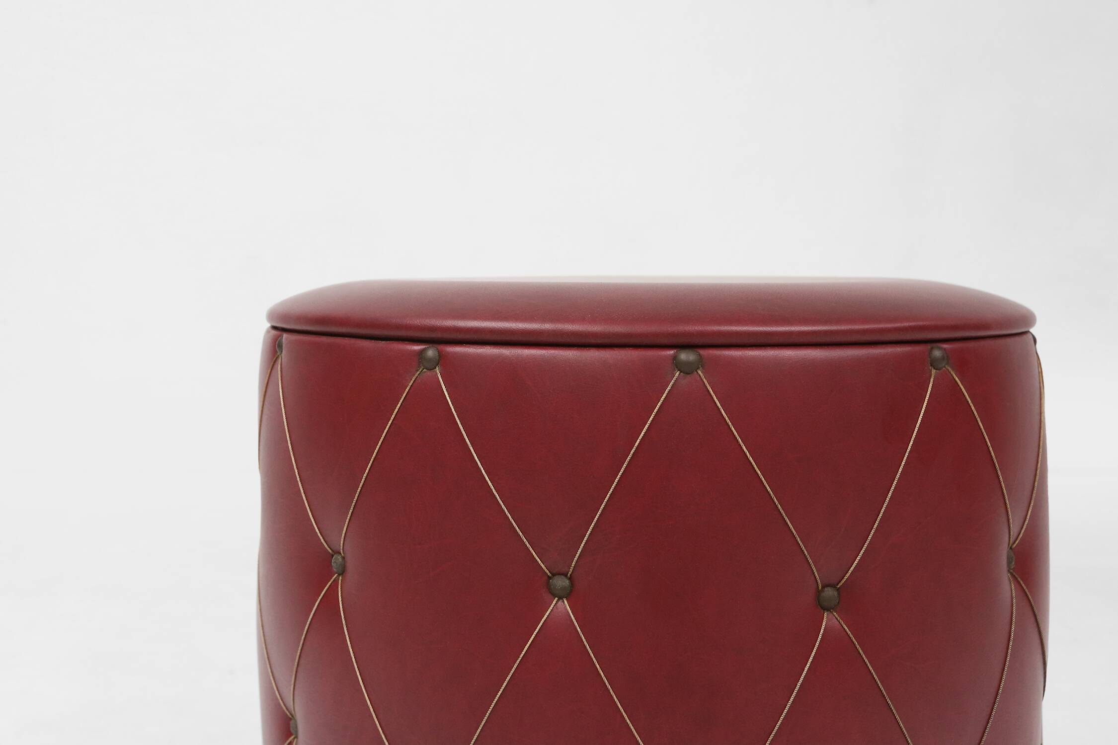 Vintage pouf with storage in dark red faux leather, France ca. 1950