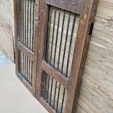 Old gate in Burmese teak and wrought iron