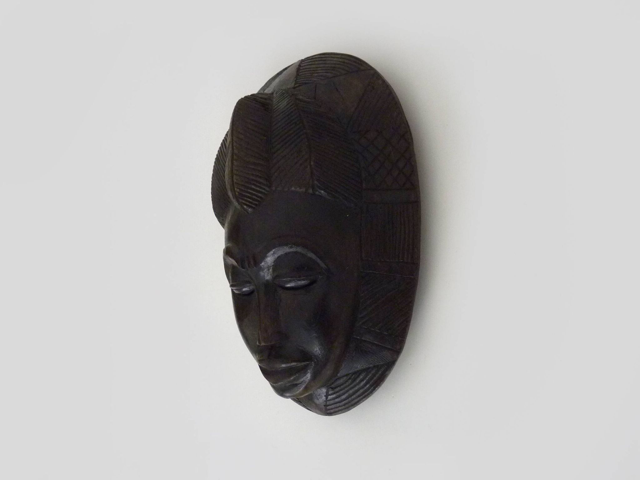 Wooden mask of the Baoulé ethnic group from Ivory Coast. African mask