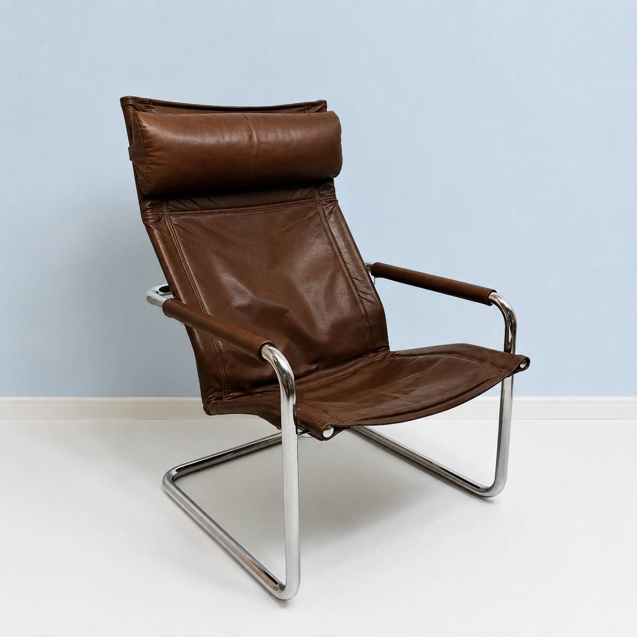 Fauteuil lounge en cuir havane et chrome – Heinrich Pfalzberger, années 197