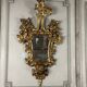 Pair of carved and gilded wooden mirrors, Italy 19th century