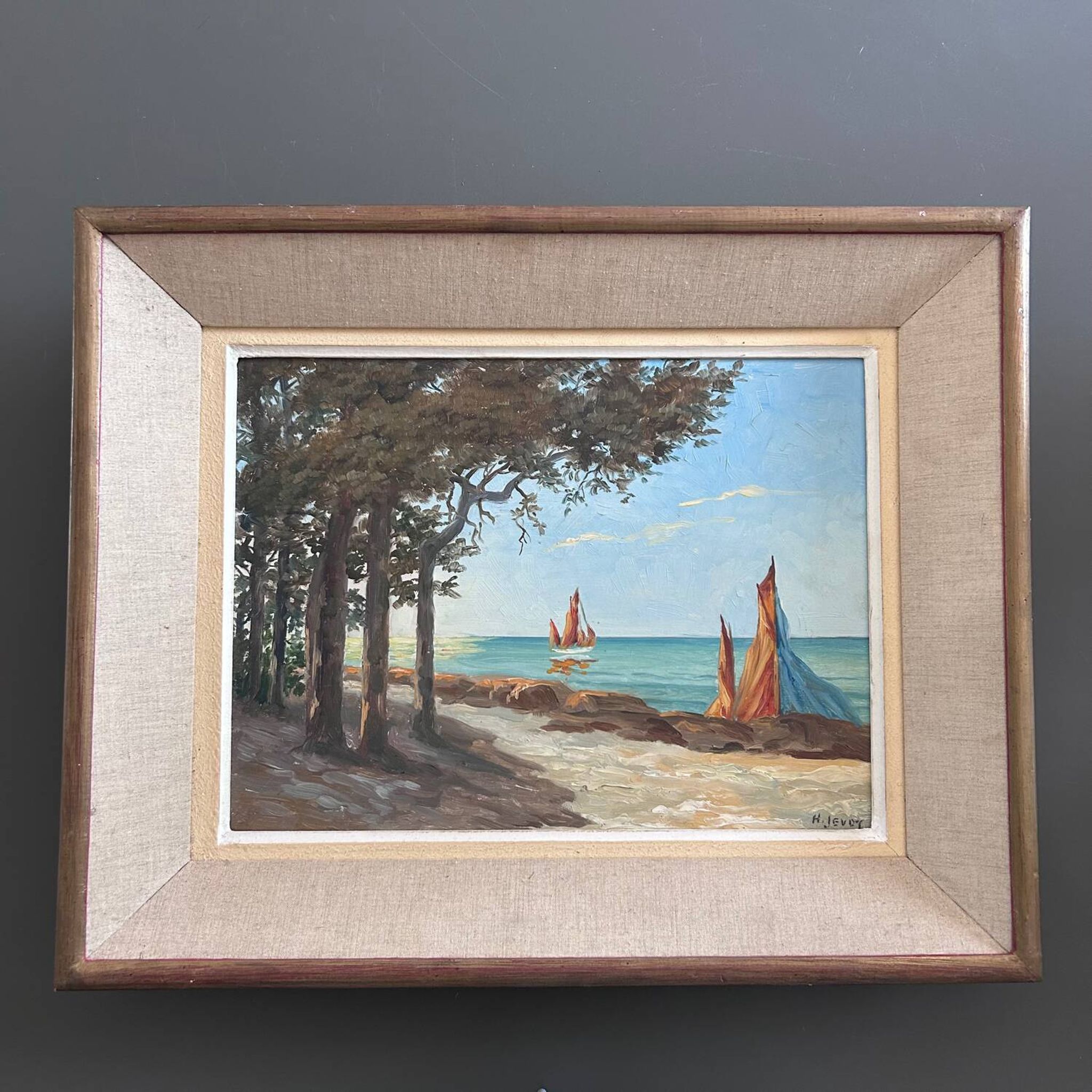 Painting of sailboats on the coast