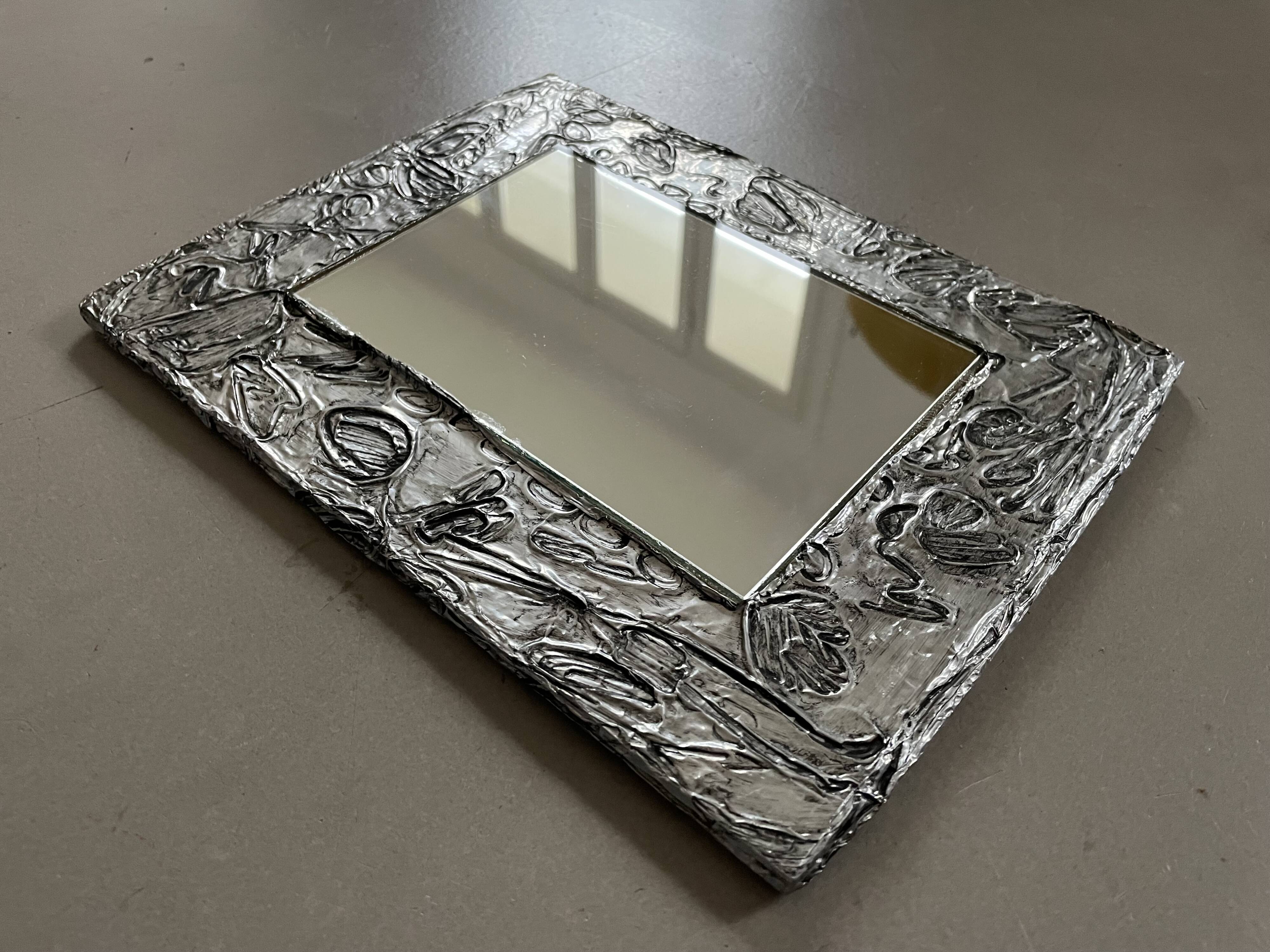 Vintage stamped mirror