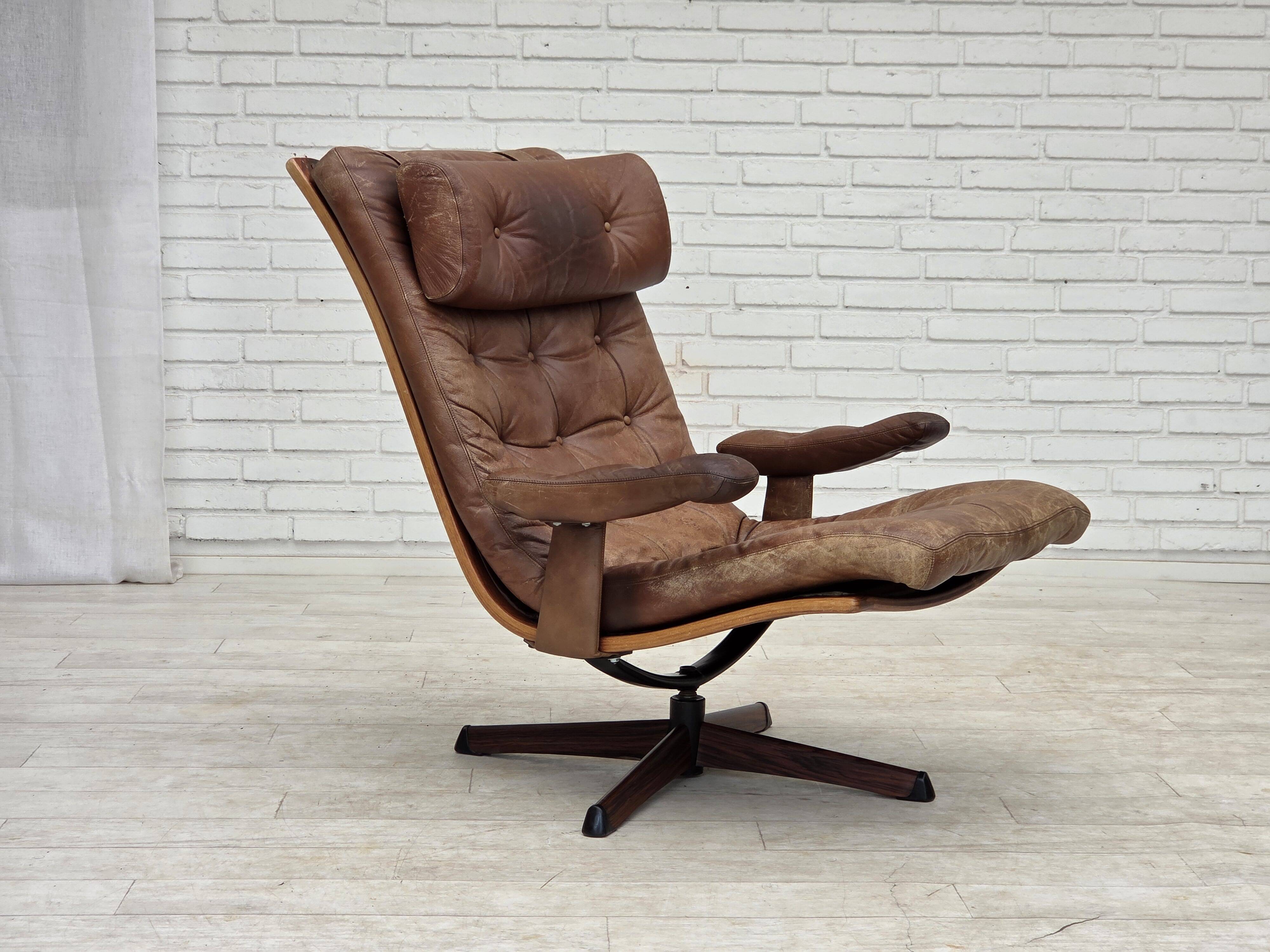 1960s, Scandinavian swivel armchair, brown furniture leather.