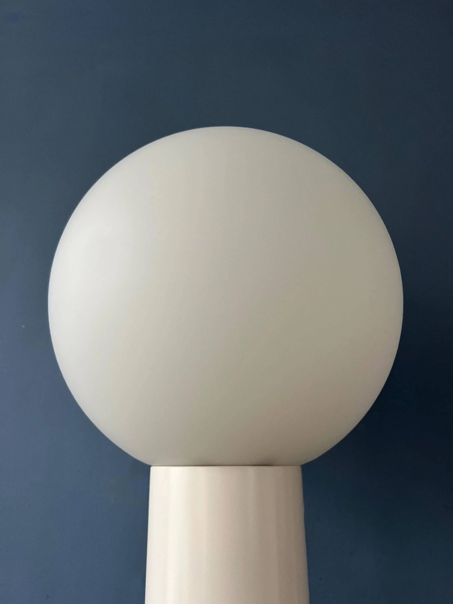 White floor lamp "Close Encounter" and plant stand by Kerst Koopman