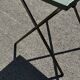 Folding garden or bistro table in khaki sheet metal from the early 1950s.