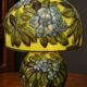 Table lamp in multilayer glass paste, adorned with a rich floral decoration.