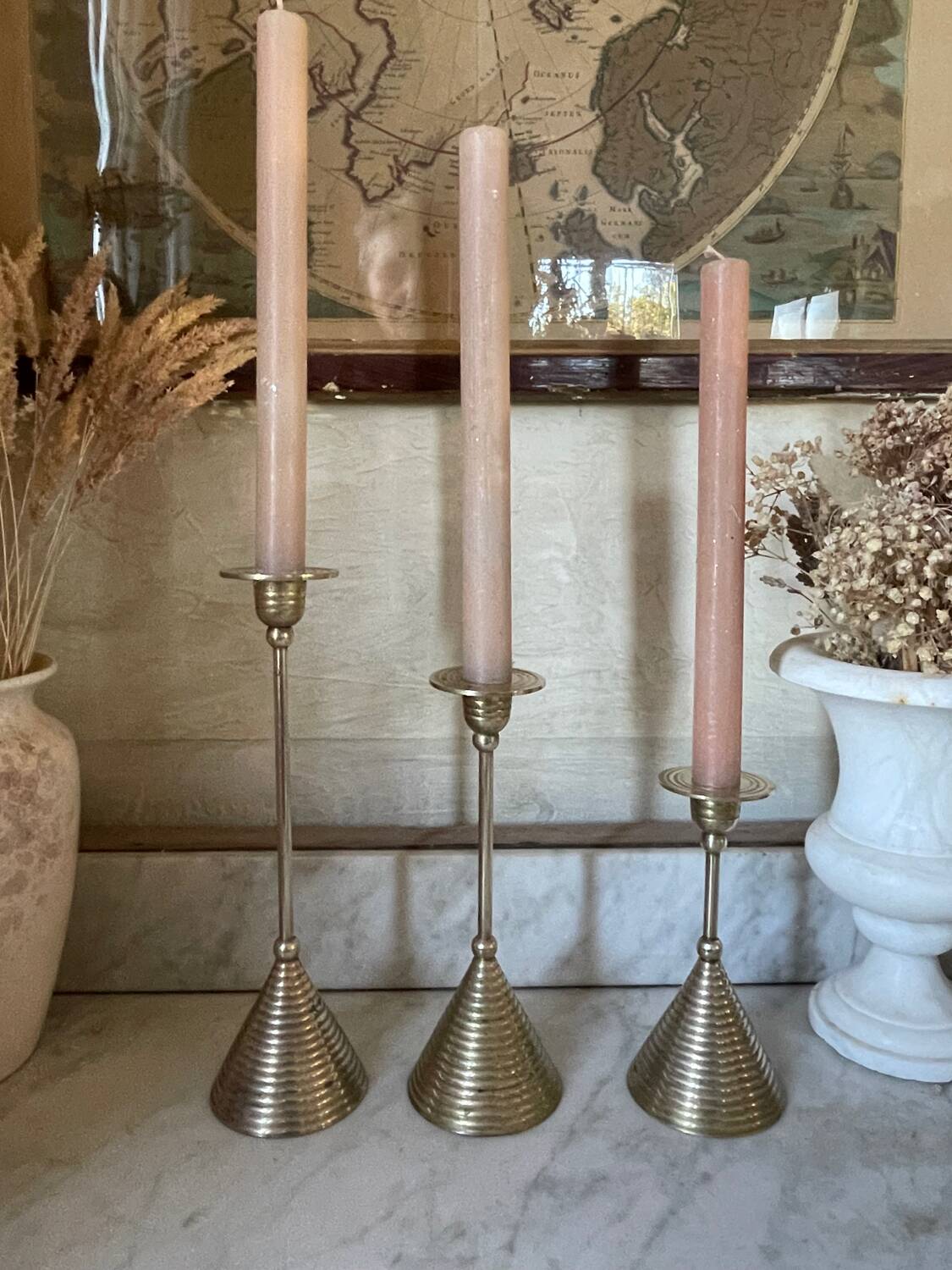 Set of three vintage brass candle holders