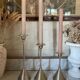 Set of three vintage brass candle holders