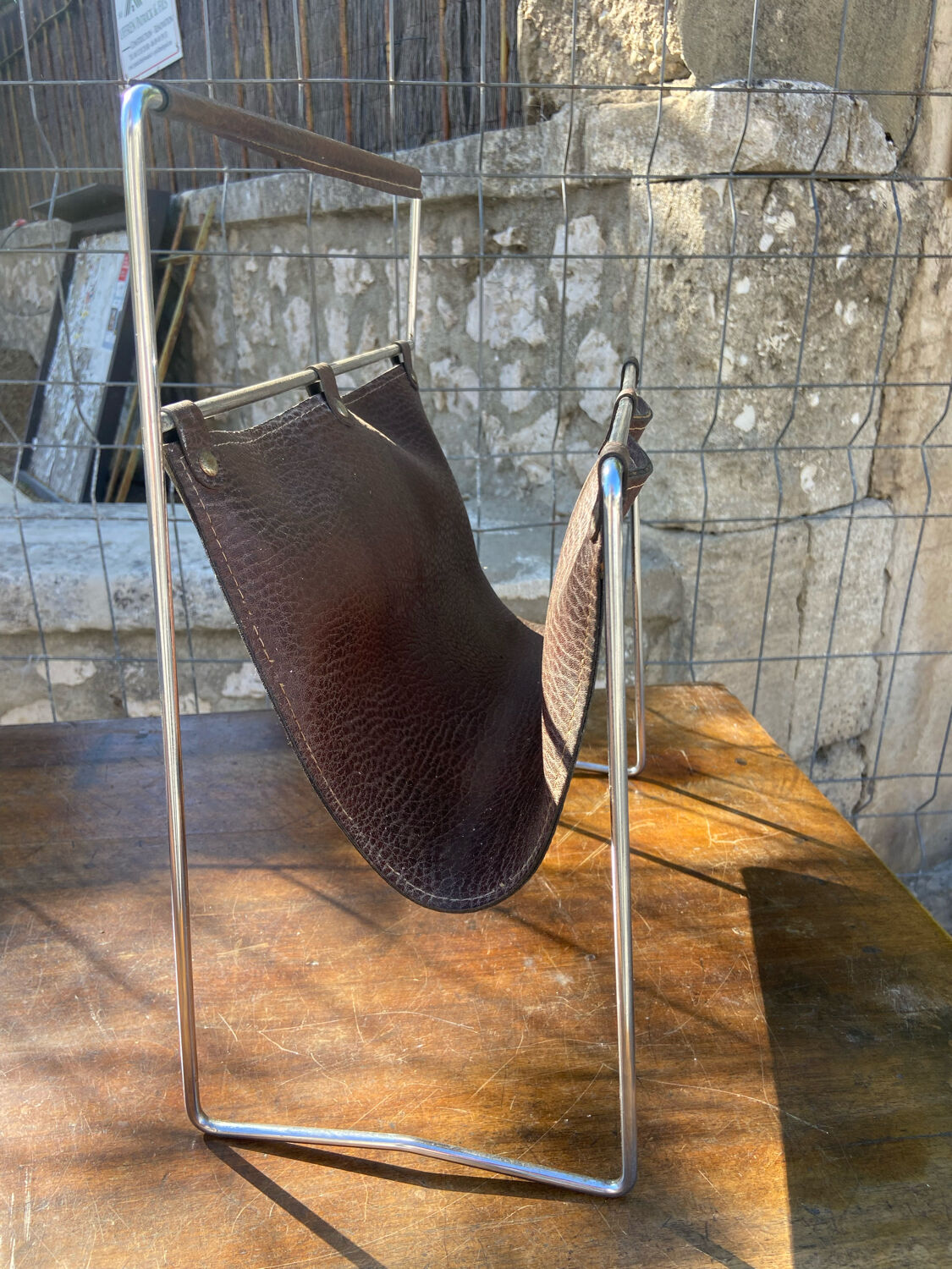 Vintage leather magazine rack