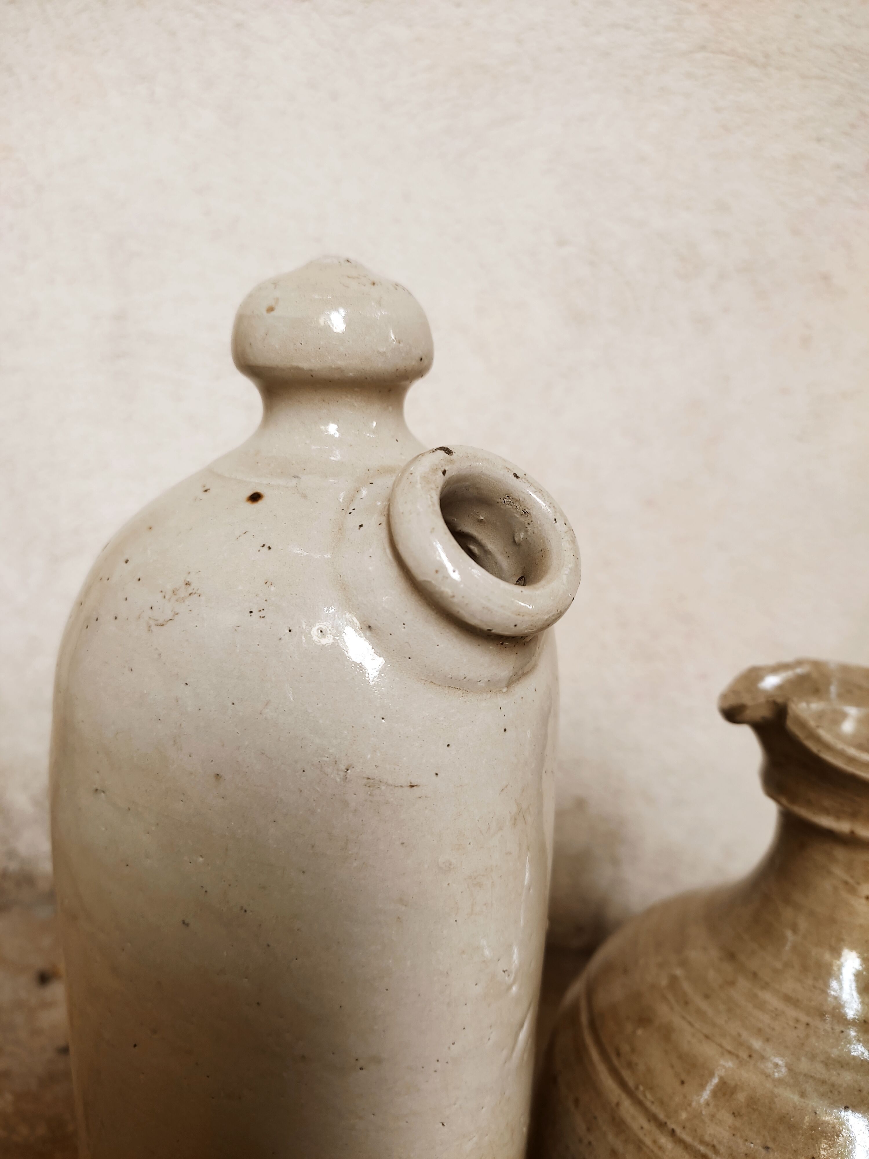 Stoneware decanters and candle holder