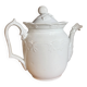 White ceramic teapot