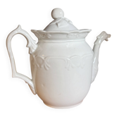 White ceramic teapot