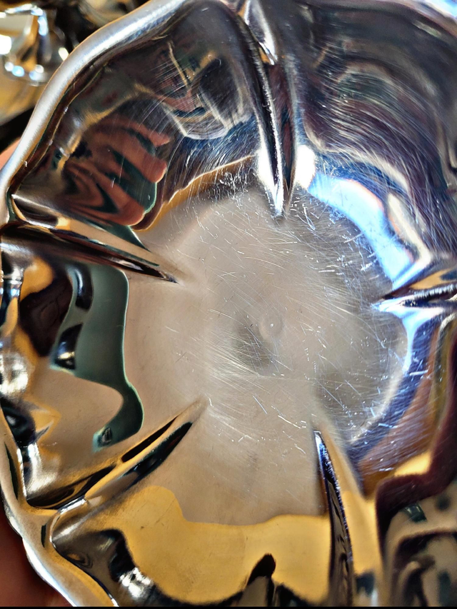 Stainless steel ice bowls by Guy Degrenne, low bowls in the shape of a flower.