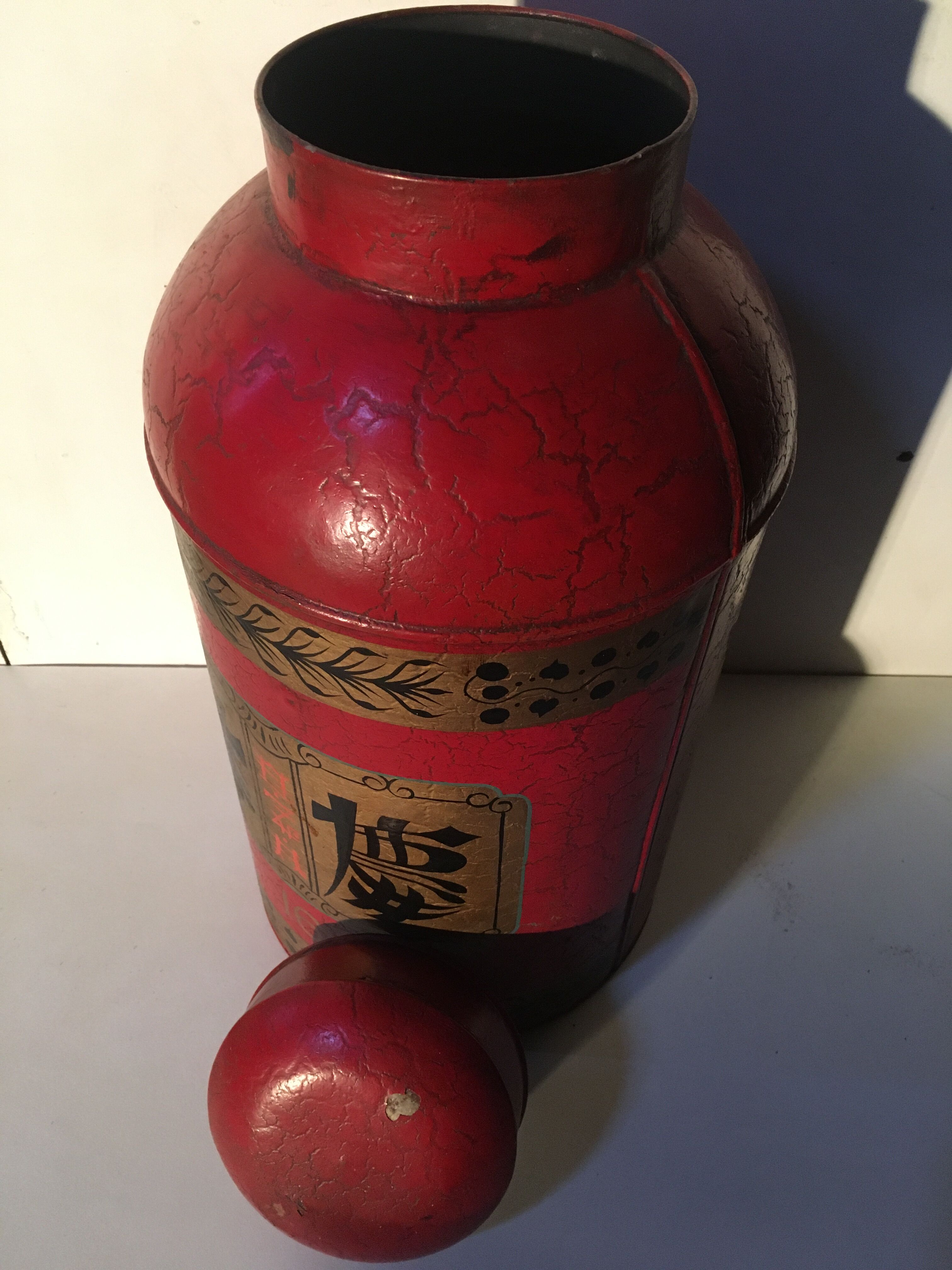 Asian red metal pot with lid