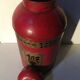 Asian red metal pot with lid
