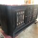 Blackened wooden sideboard of the 1950s