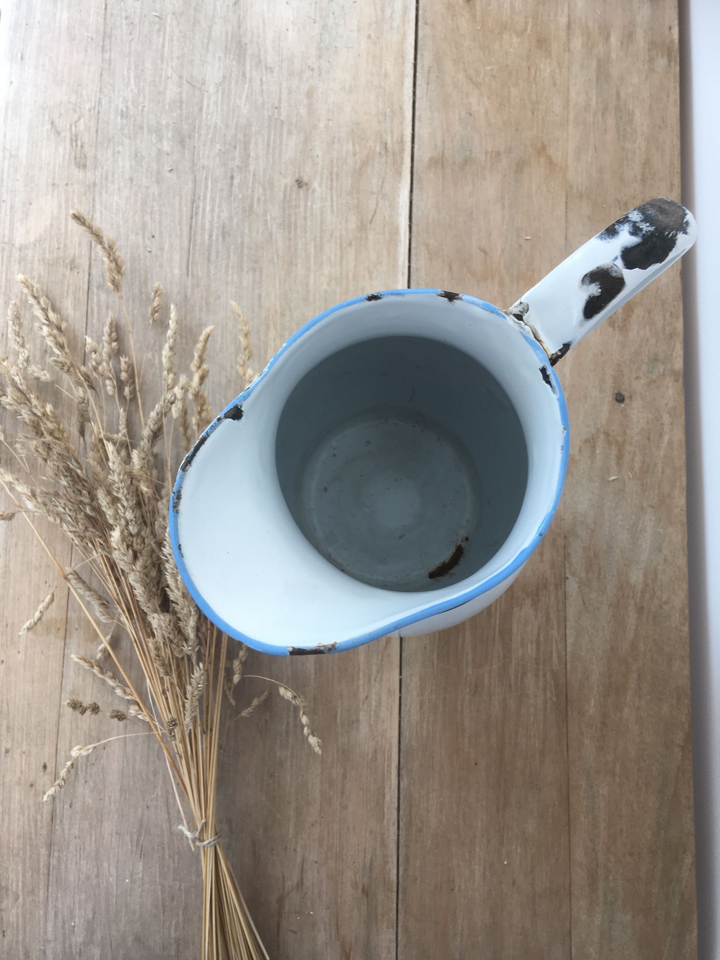 White enamelled sheet metal pitcher blue pattern
