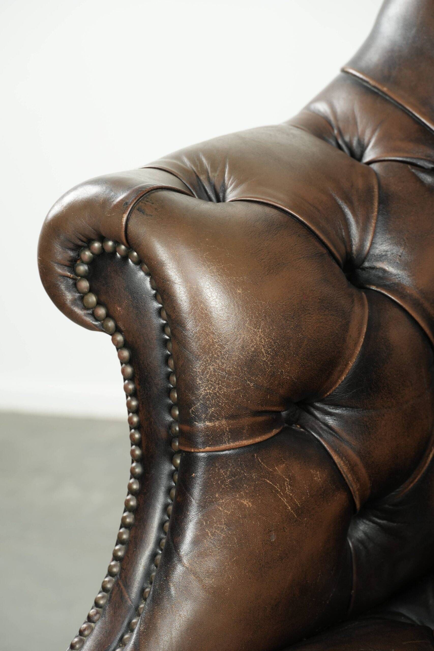 Vintage Chesterfield office chair with decorative nails in English style