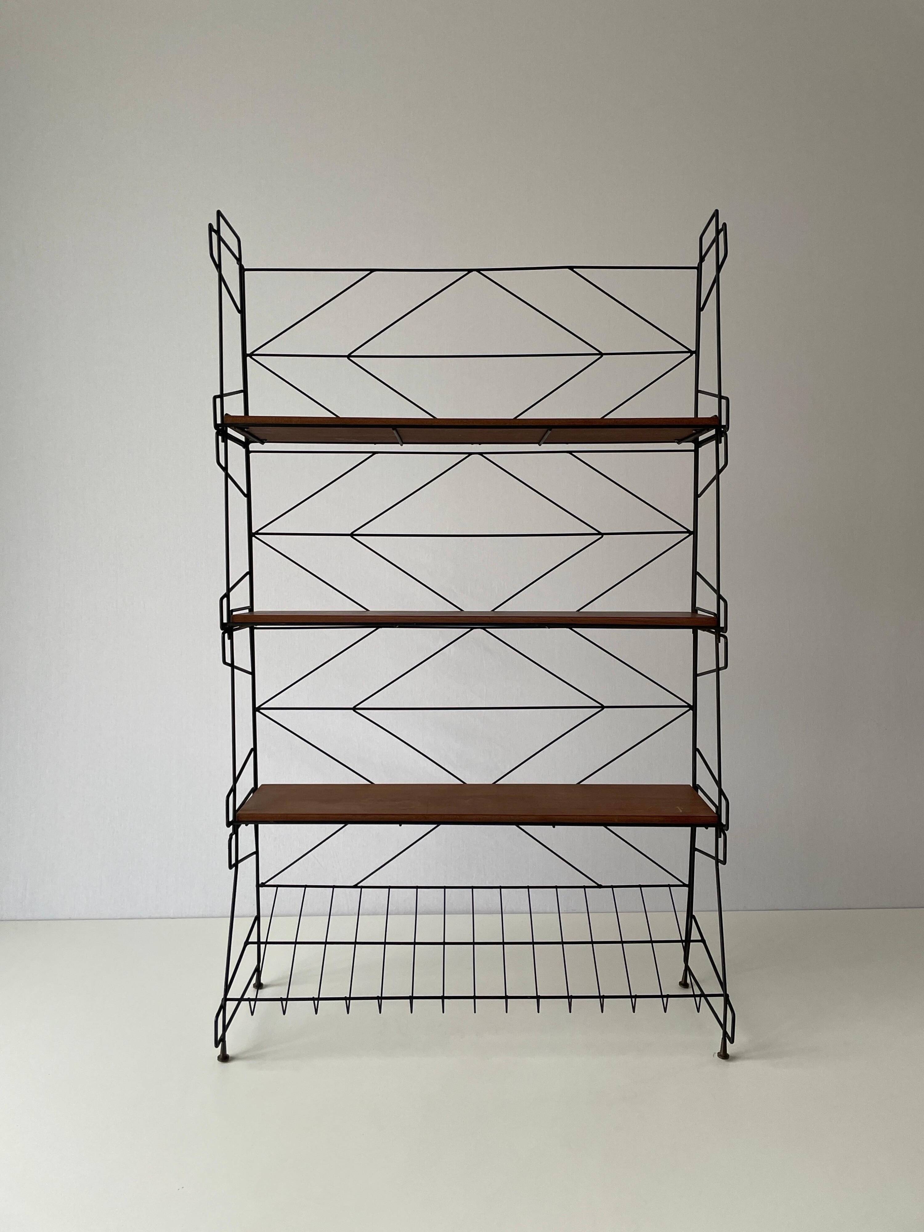 Free-standing shelf with a metal structure and 3 shelves, 1960s, Italy.