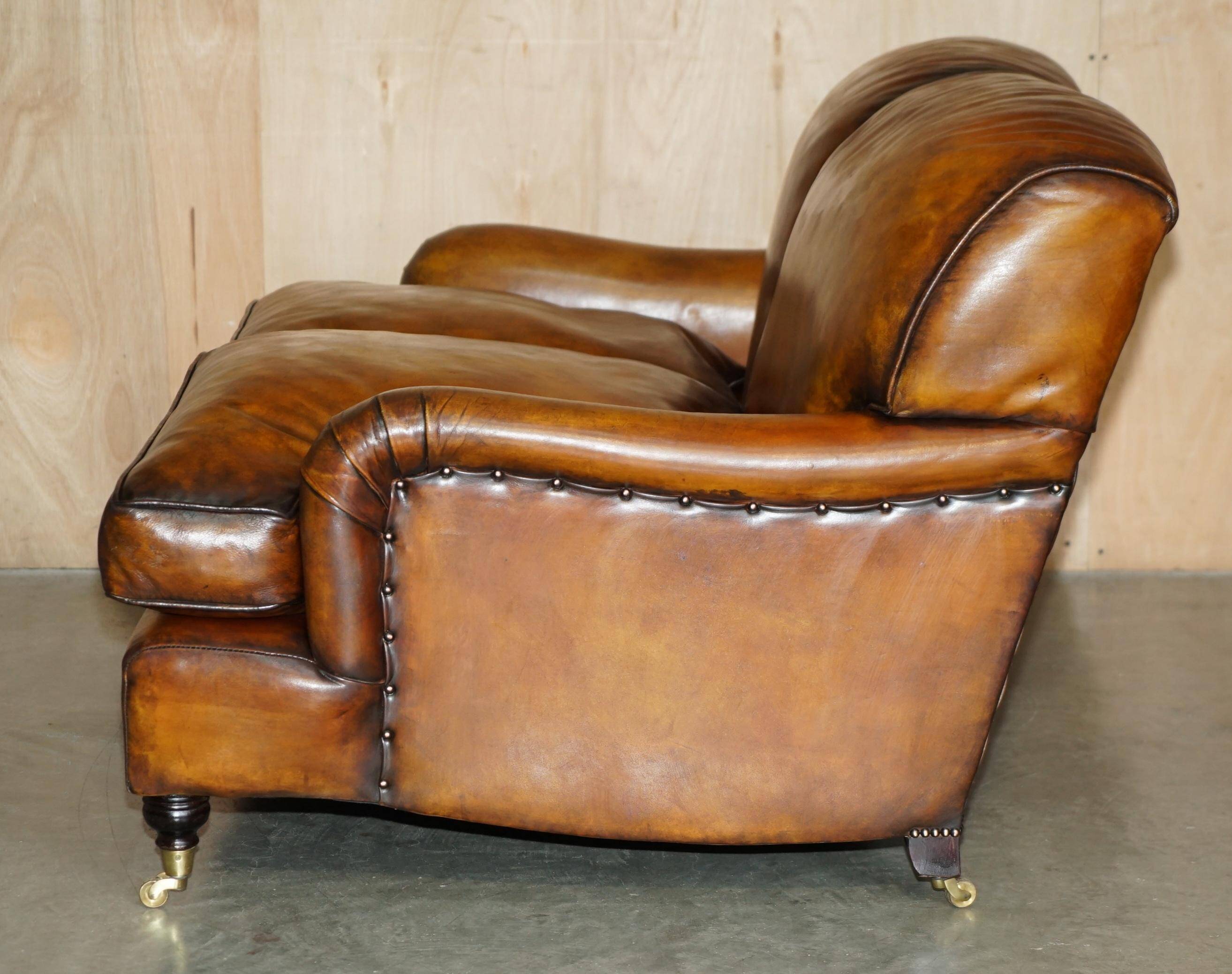Howard & Son restored leather canapé, width 145 cm