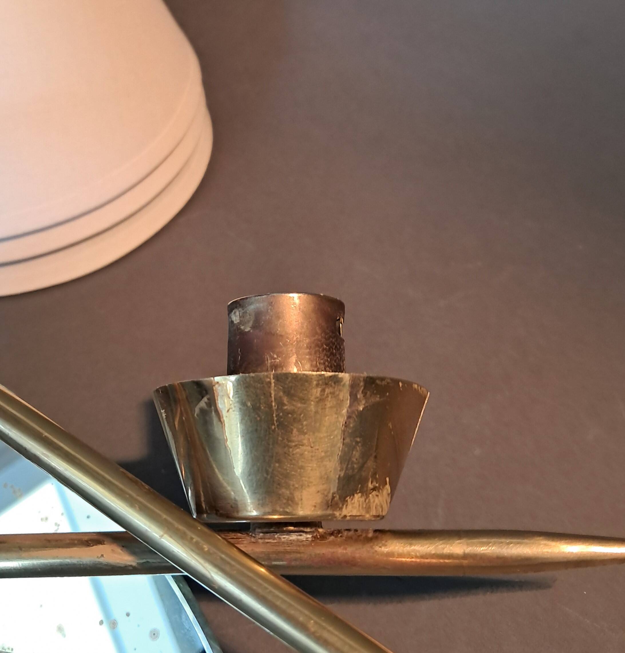 Pair of gilded brass and mirror wall lights, Circa 1960.