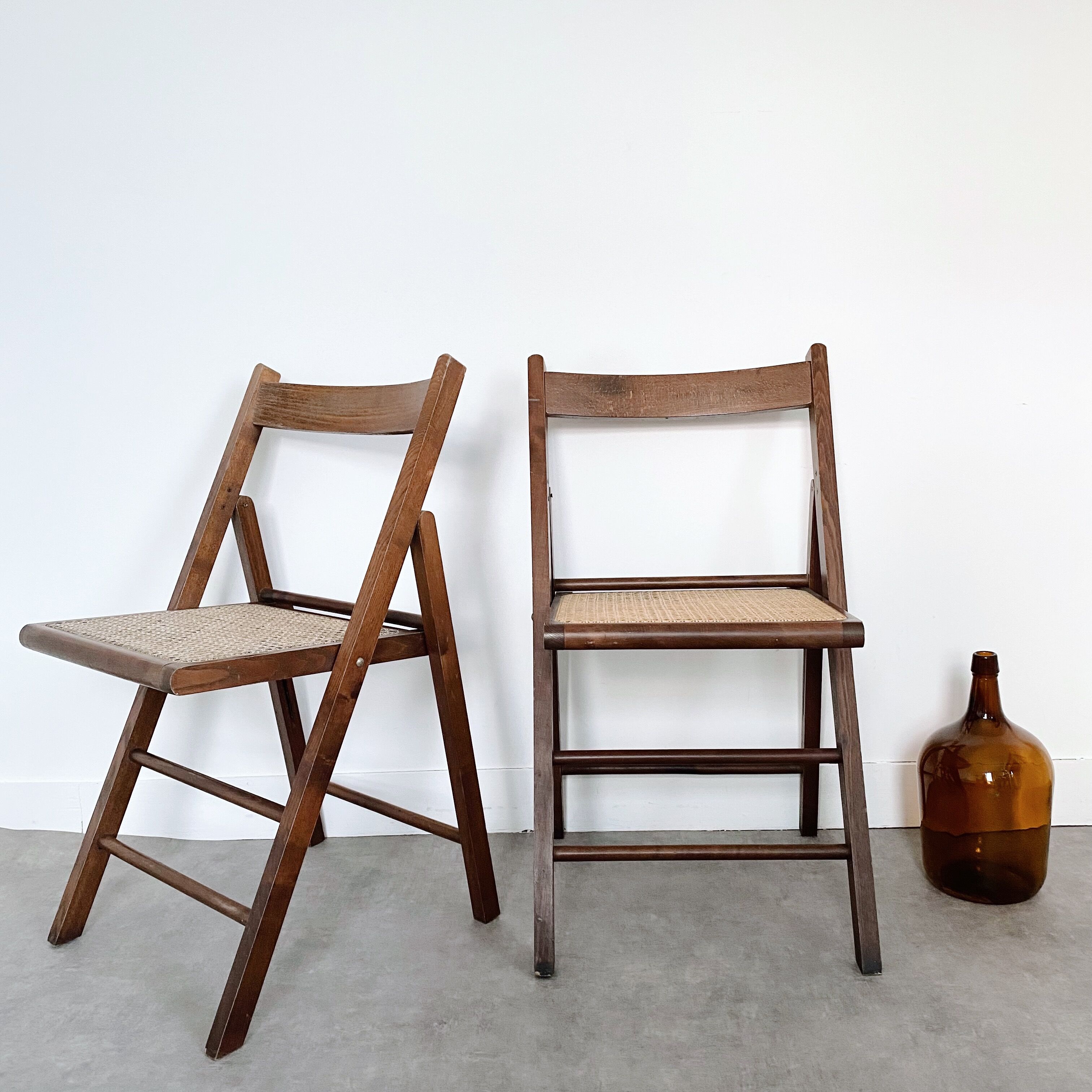 Two folding chairs wood and cannage