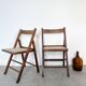 Two folding chairs wood and cannage