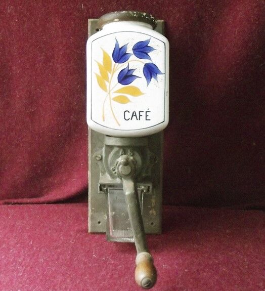 Old wall-mounted coffee grinder
