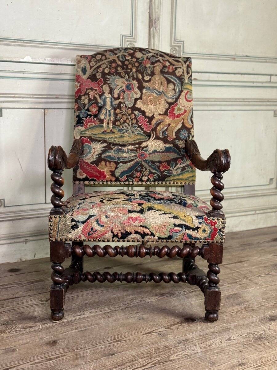 Carved walnut and tapestry armchair, late 17th century
