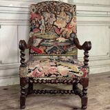 Carved walnut and tapestry armchair, late 17th century
