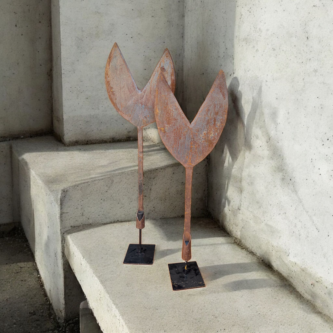 Pair of hay cutters on stands