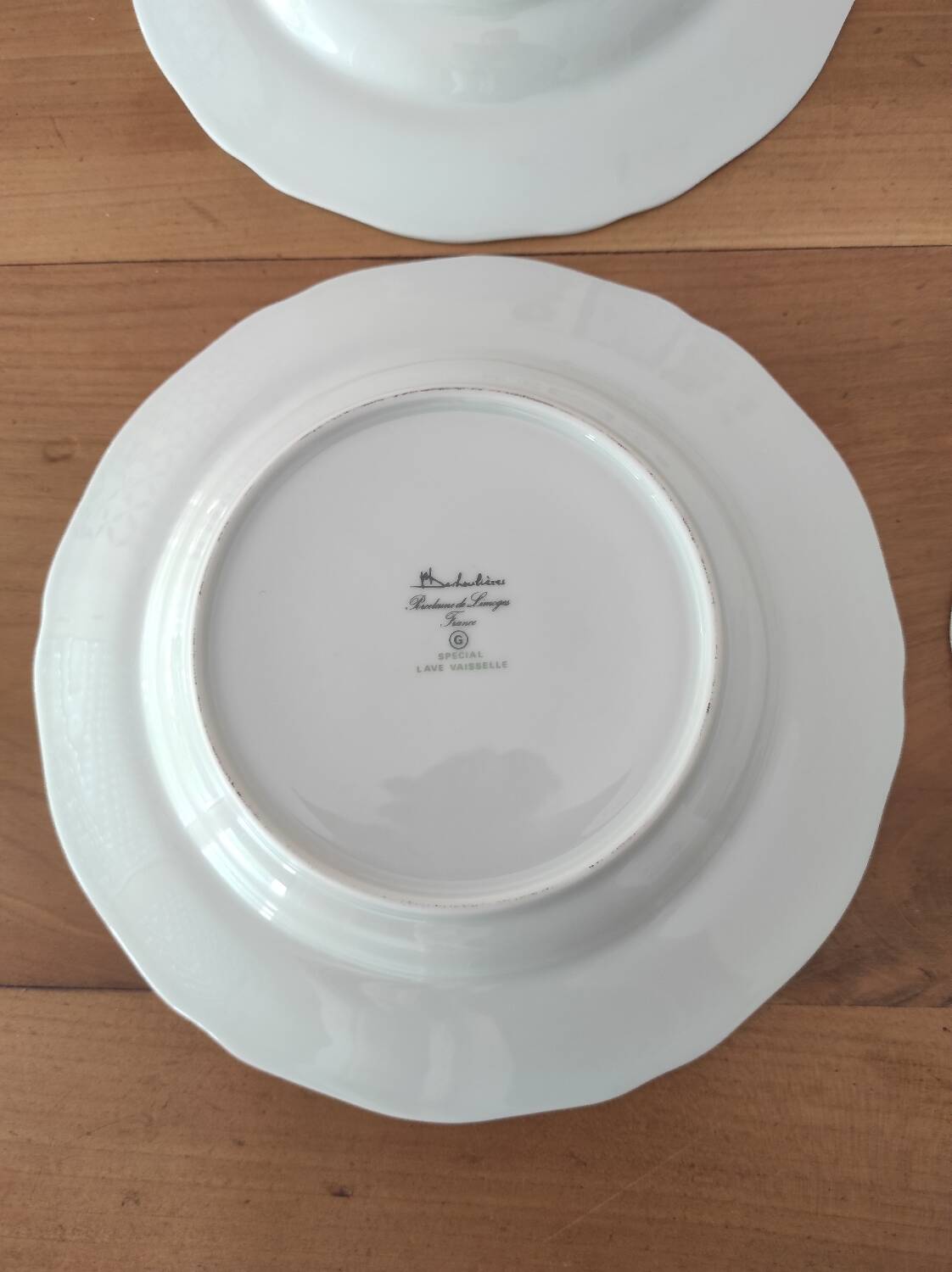 Set of 4 Limoges porcelain soup plates