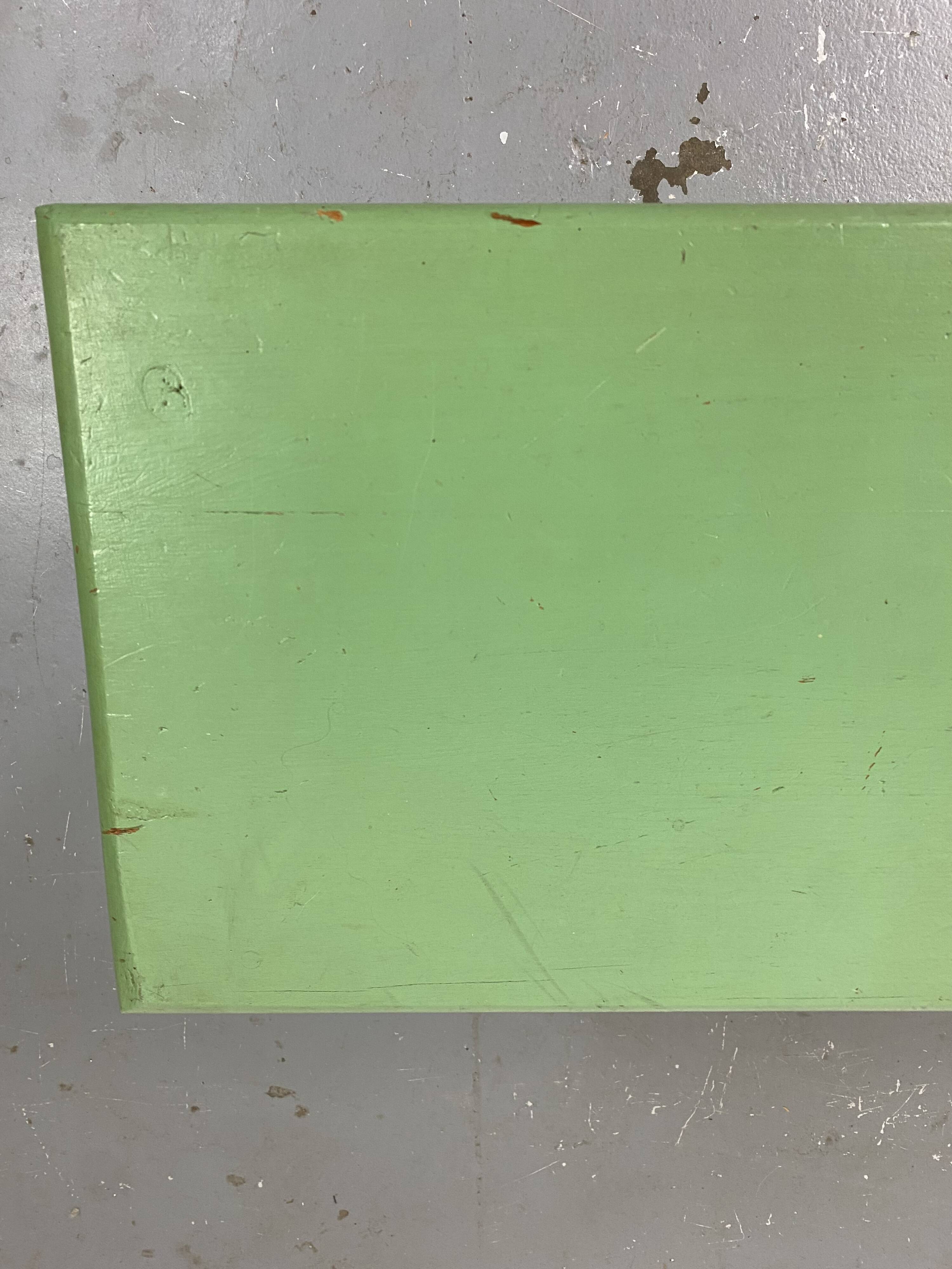 Green wooden bench
