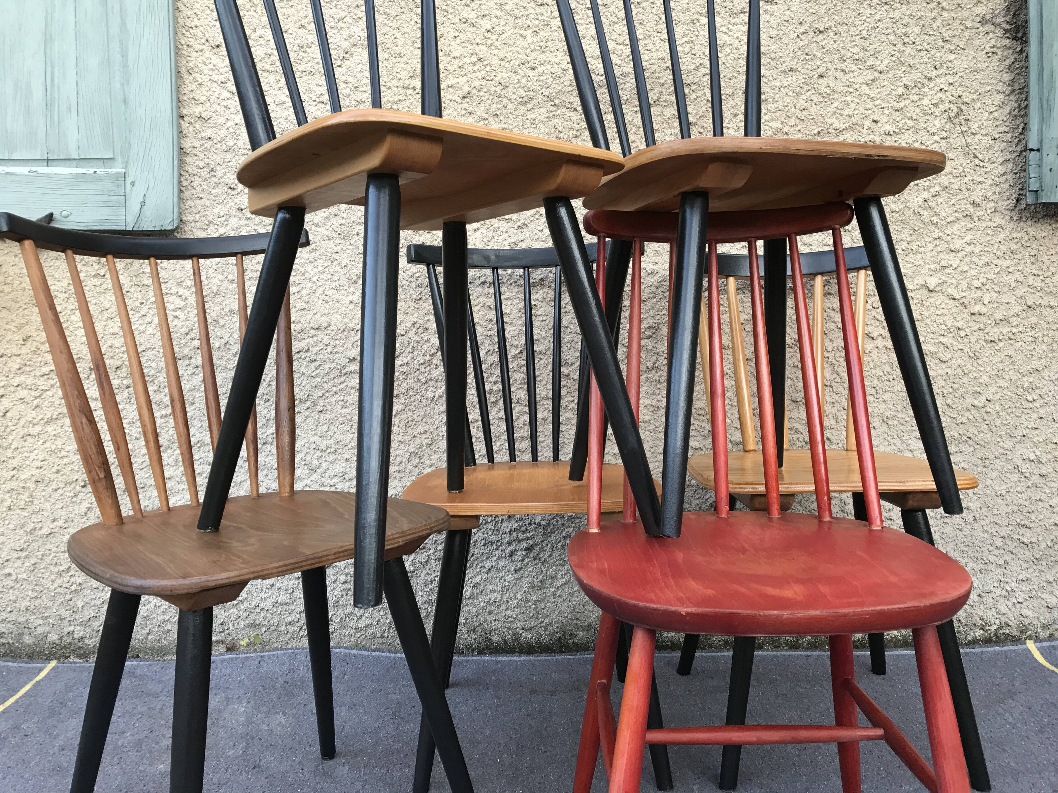 Set of 6 mismatched vintage chairs with bars and compass legs