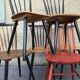 Set of 6 mismatched vintage chairs with bars and compass legs
