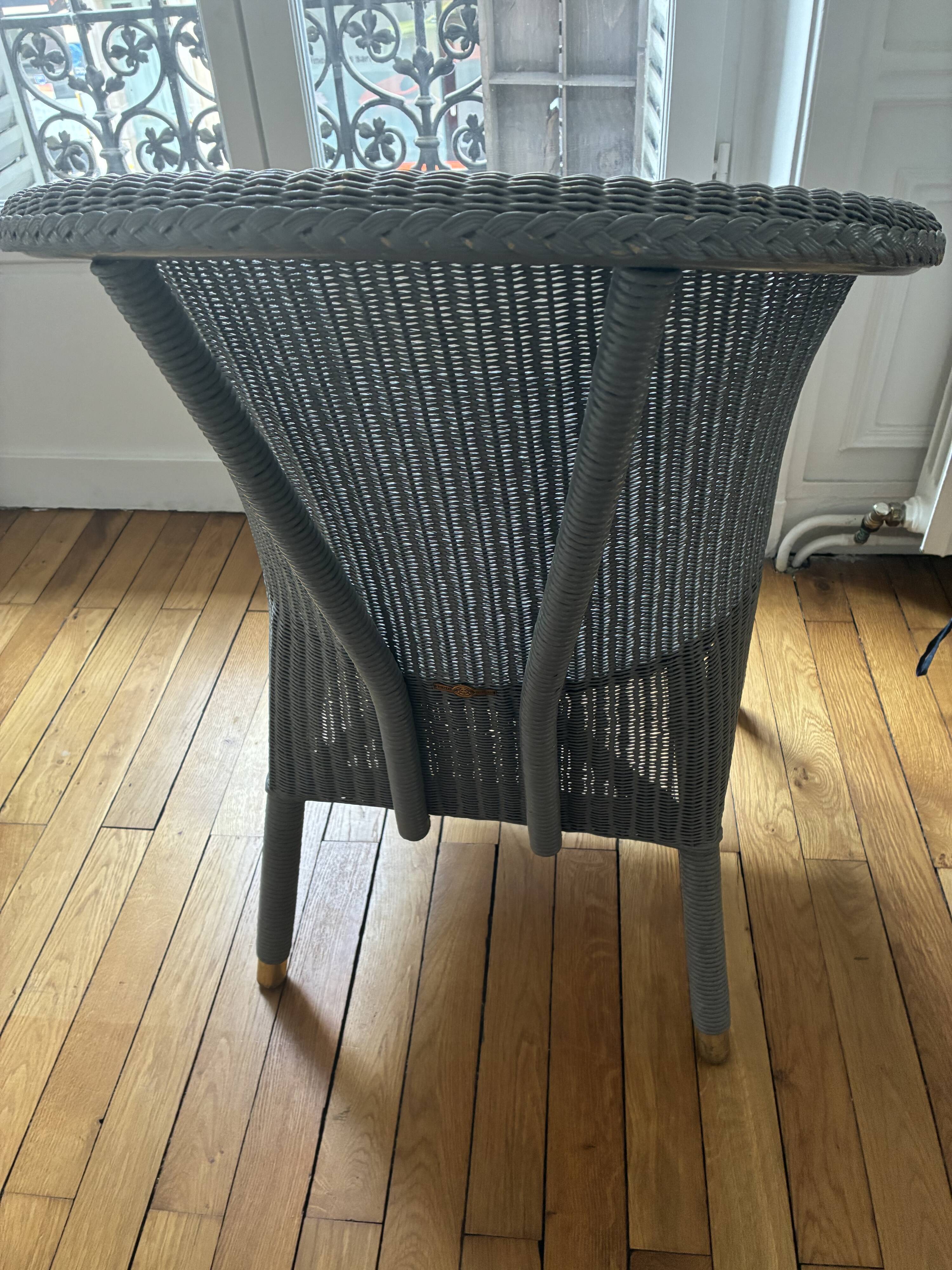 Blue grid rattan armchair