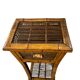 Vintage bamboo side table with drawer from the 20th century.