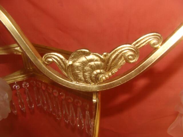 Art Deco period chandelier (1925) with four light arms.