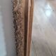 Antique Louis Philippe mirror with a pediment.