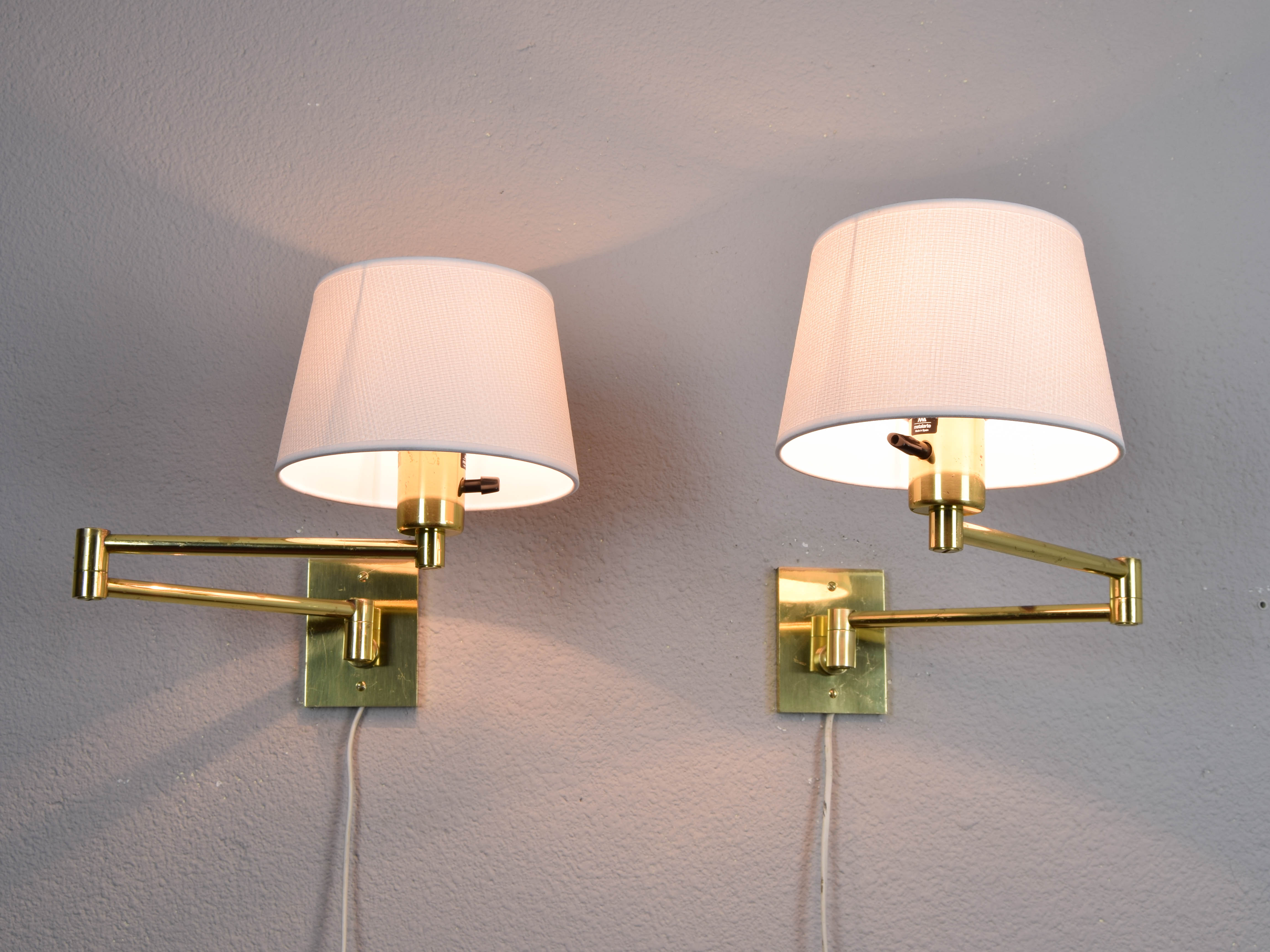 Two Mid-Century Modern Swing Arm Brass Sconces by George W Hansen for Metalarte