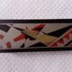 Old lacquered wooden glove box/box with Art Deco geometric decoration. Japan