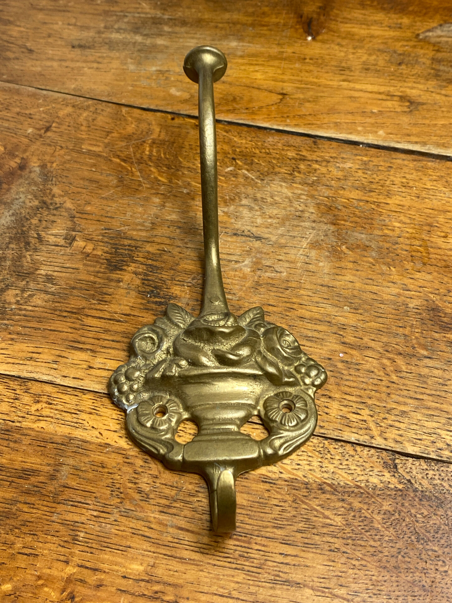 Wall-mounted brass hook