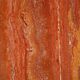 Willy Rizzo. Large table in orange-red travertine. 1970s.