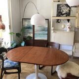 Dining table with a modular tulip foot