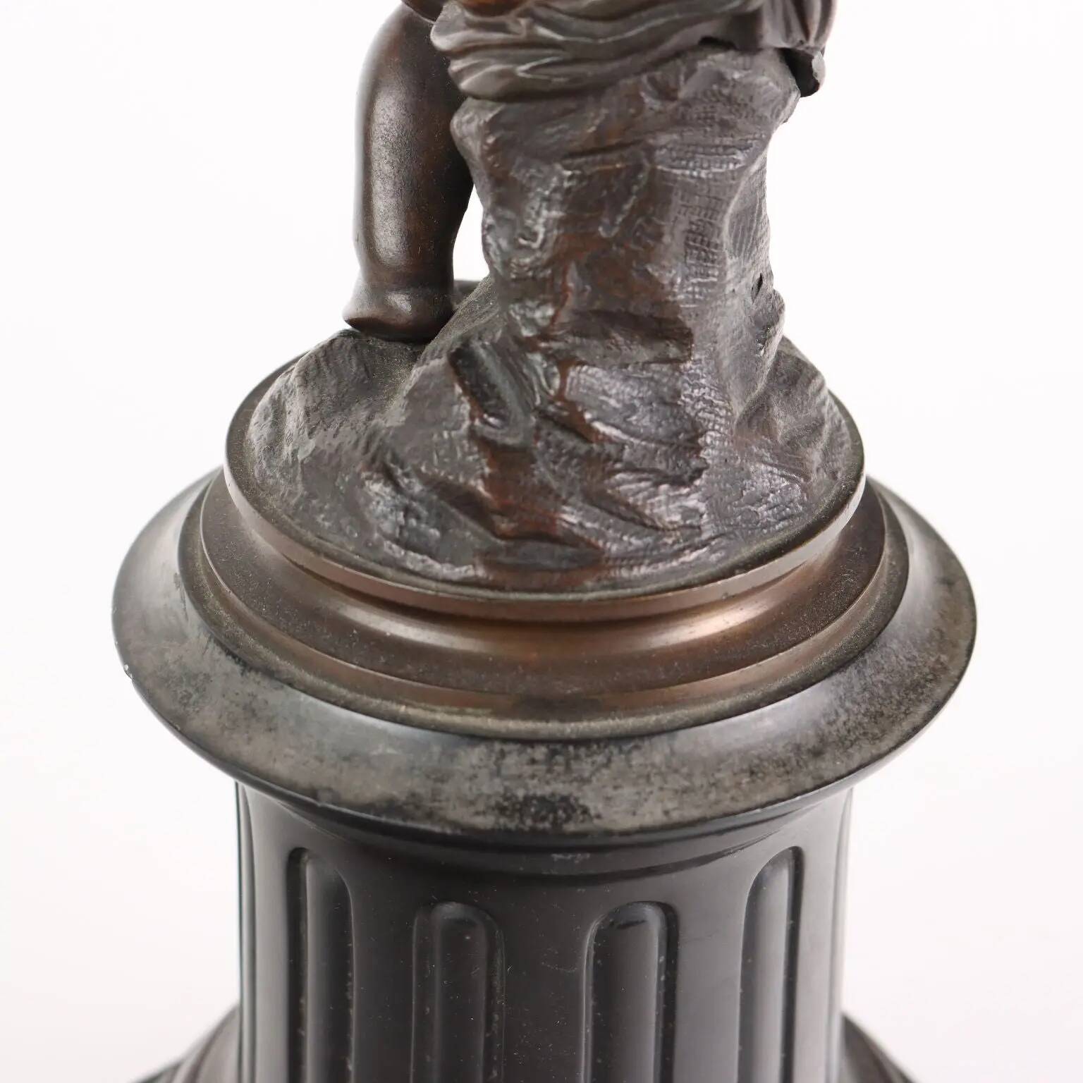 Antique candelabrum in bronze and black marble, Europe, 19th century.
