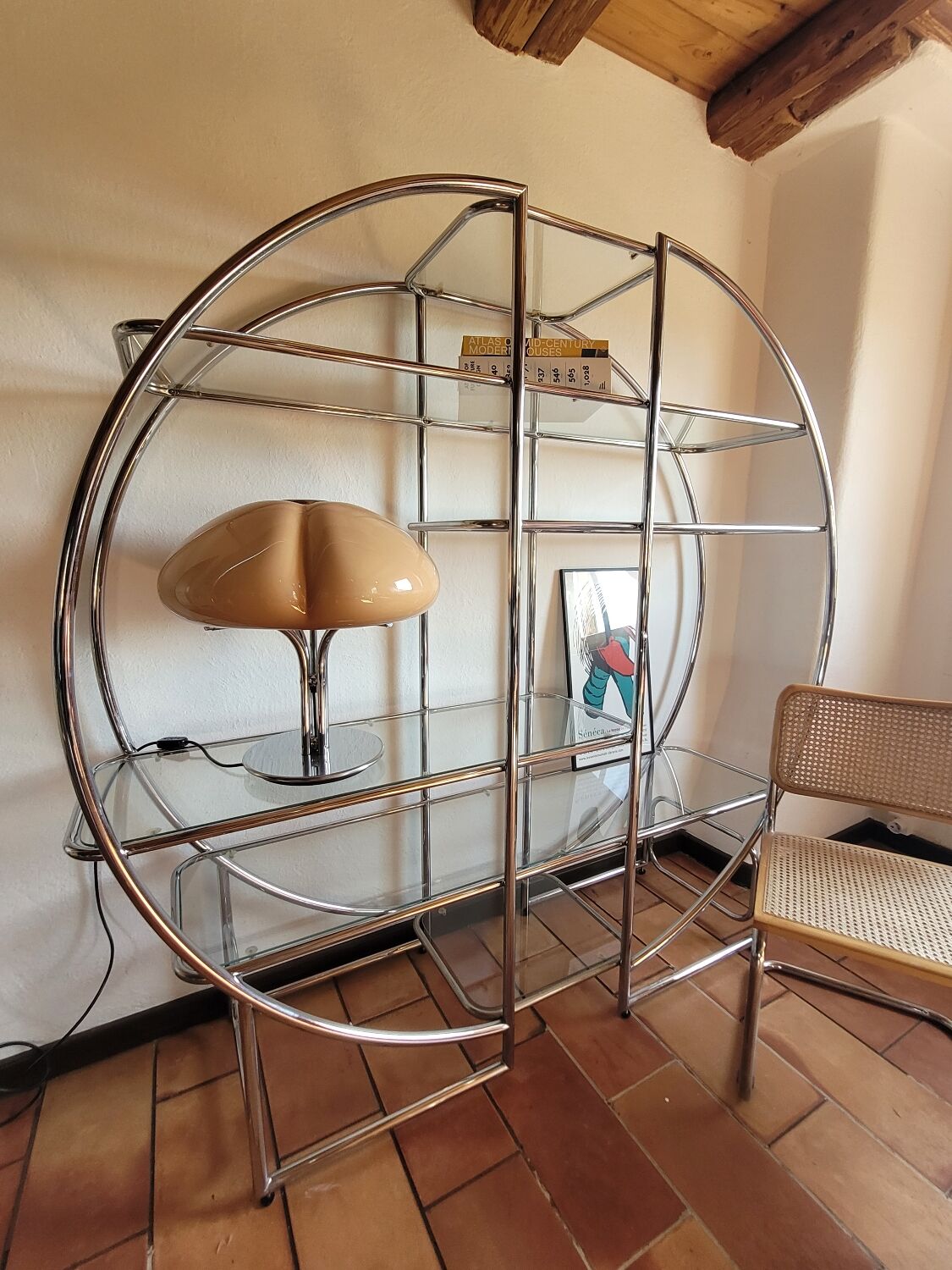Bauhaus-style chrome round shelf