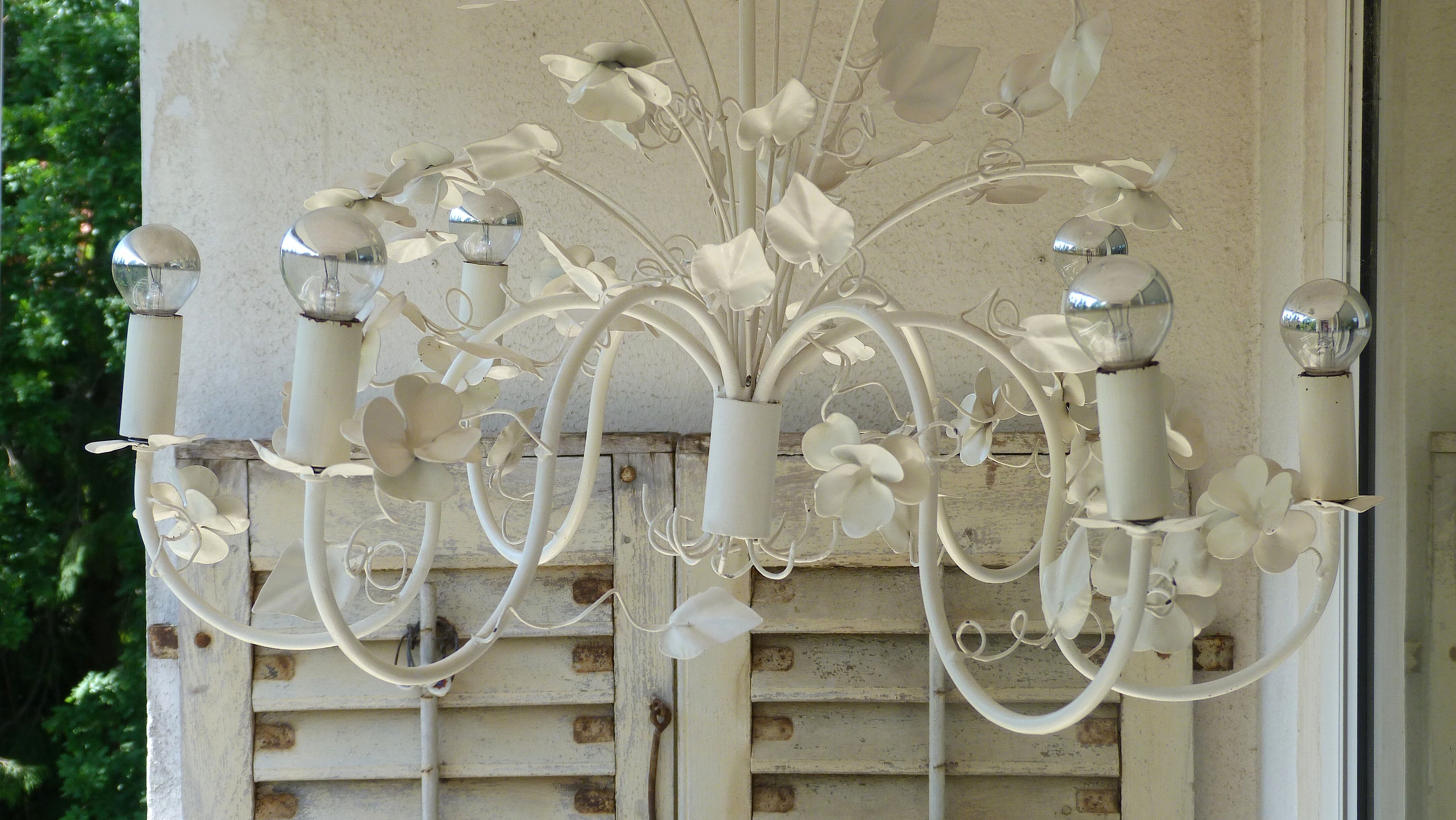 Vintage chandelier in painted metal decoration foliage and flowers